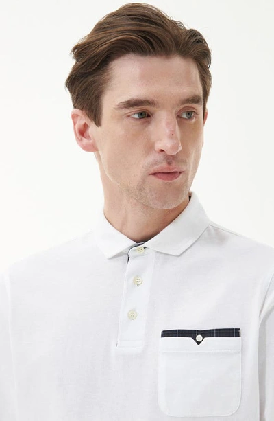 Shop Barbour Corpatch Long Sleeve Polo In White
