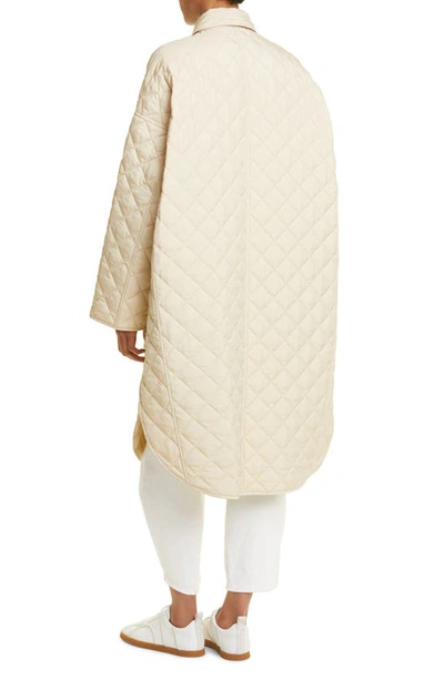 Shop Totême Water Repellent Quilted Cocoon Coat In Stone