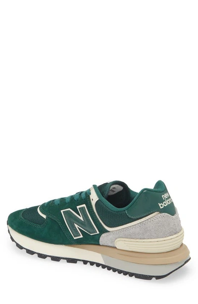Shop New Balance 574 Sneaker In Green