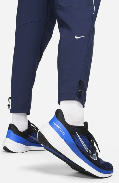 Shop Nike Dri-fit Challenger Track Club Running Pants In Midnight Navy/ White/ White