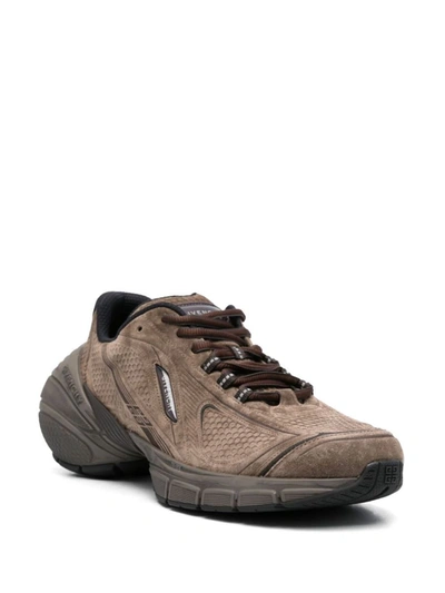 Shop Givenchy Sneakers In Brown