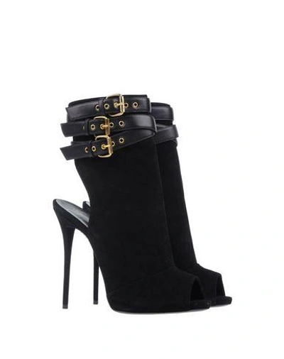 Shop Giuseppe Zanotti Sandals In Black