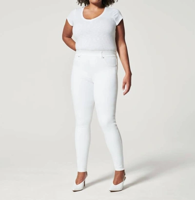 Shop Spanx Ankle Skinny Jeans In White