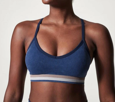 Shop Spanx Soft Stretch Seamless Low Impact Sports Bra In Midnight Navy In Blue