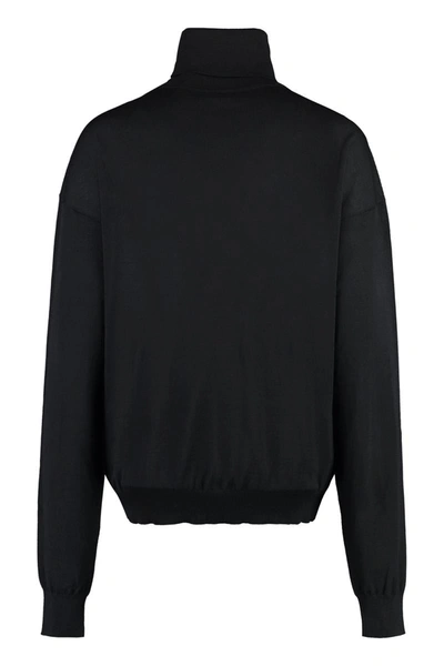 Shop Saint Laurent Turtleneck Wool Pullover In Black