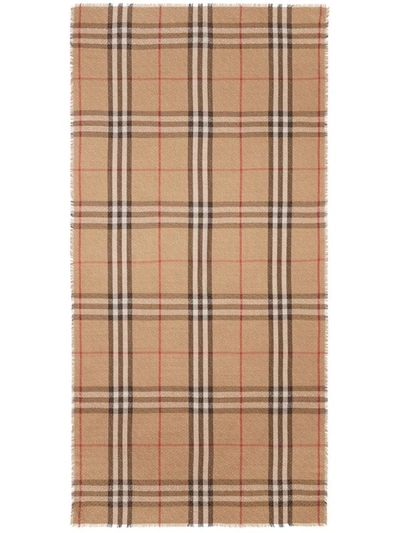 Shop Burberry Check Motif Wool And Silk Blend Scarf In Beige