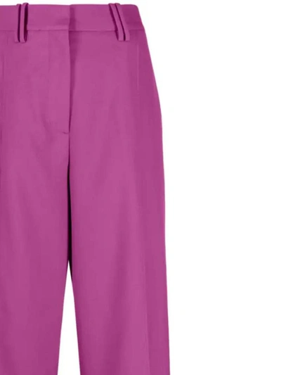 Shop Ganni Trousers In Purple Wine