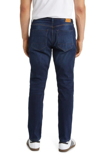 Shop Duer Relaxed Tapered Performance Denim Jeans In Dark Stone