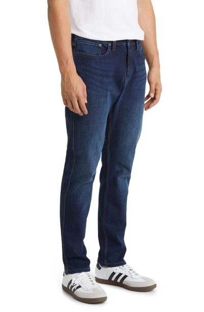 Shop Duer Relaxed Tapered Performance Denim Jeans In Dark Stone