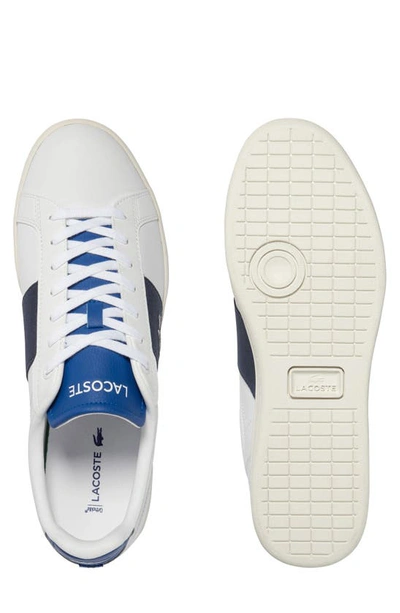 Shop Lacoste Carnaby Pro Sneaker In White/ Dark Blue