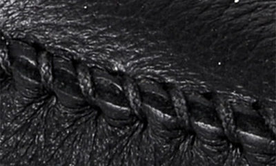 Shop Minnetonka Discover Deerskin Loafer In Black
