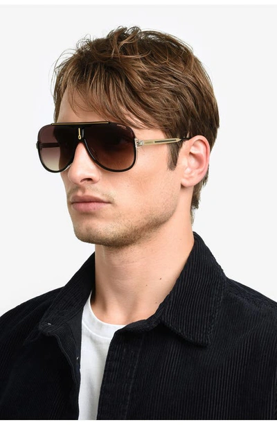 Shop Carrera Eyewear 64mm Oversize Aviator Sunglasses In Black Gold/ Brown Gradient