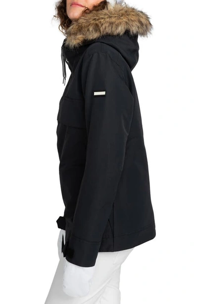 Shop Roxy Shelter Hooded Snow Jacket With Removable Faux Fur Trim In True Black