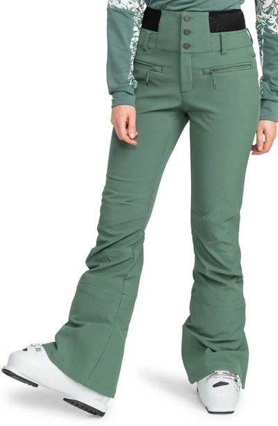Shop Roxy Rising High Waterproof Shell Snow Pants In Dark Forest