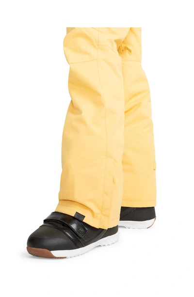Shop Roxy Nadia Insulated Waterproof Snow Pants In Sunset Gold