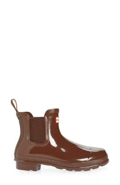 Shop Hunter Original Gloss Waterproof Chelsea Boot In Brown Bolt