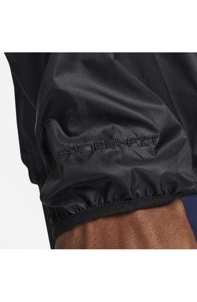 Shop Nike Storm-fit Track Club Woven Running Jacket In Black/ Midnight Navy/ White