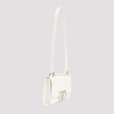 Shop Valentino Garavani  Shoulder Bag In White