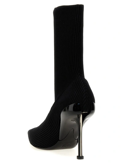 Shop Alexander Mcqueen 'slash' Ankle Boots In Black