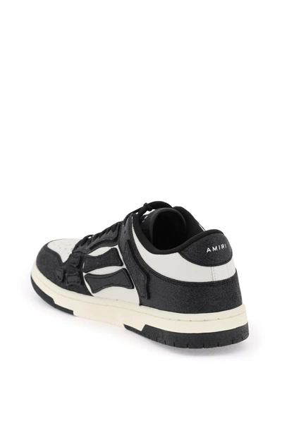 Shop Amiri Skel Top Low Sneakers