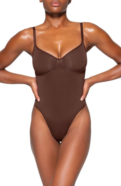 Shop Skims Seamless Sculpt Thong Bodysuit In Cocoa