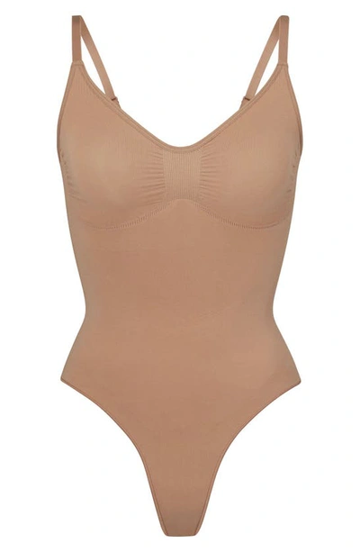 Skims Deep Plunge Strapless Thong Shapewear Bodysuit Thong Clay In Sienna