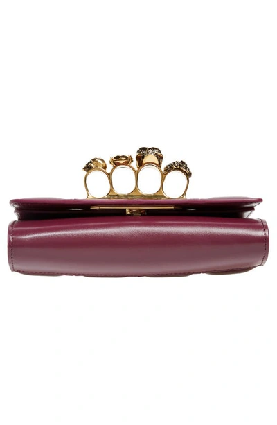 Shop Alexander Mcqueen Slash Cutout Knuckle Leather Clutch In 6000 Burgundy