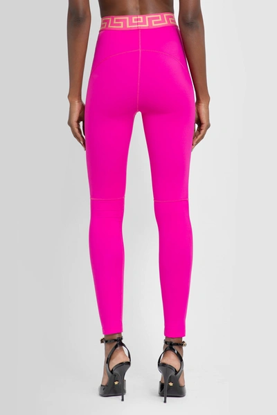 Shop Versace Woman Pink Leggings
