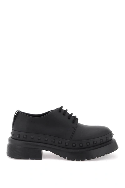 Shop Valentino Garavani Rockstud M-way Leather Derby Shoes In Black