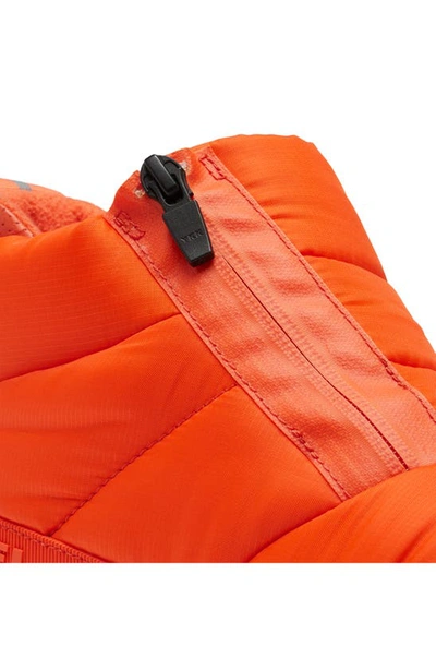 Shop Sorel Kinetic Impact Waterproof Zip Bootie In Optimized Orange/ Bleached