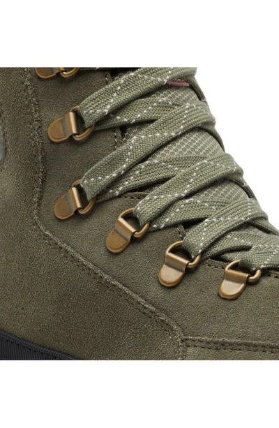 Shop Sorel Kinetic Impact Conquest Waterproof Sneaker Bootie In Stone Green/ Chalk