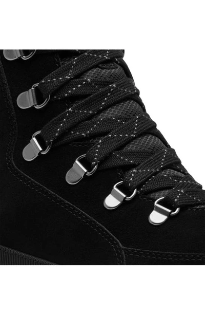 Shop Sorel Kinetic Impact Conquest Waterproof Sneaker Bootie In Black/ Sea Salt