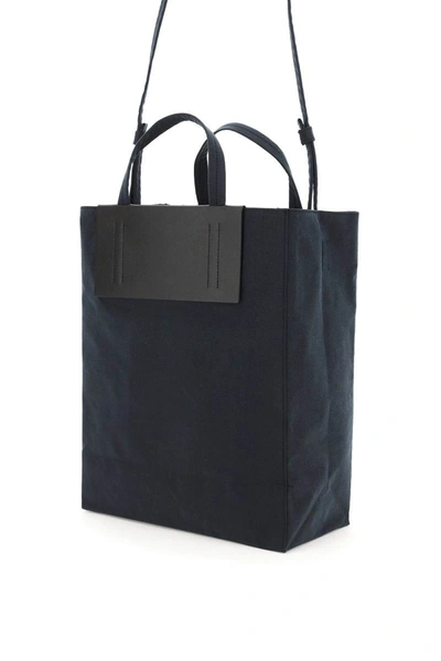 Shop Acne Studios Baker Out Medium Tote Bag In Black