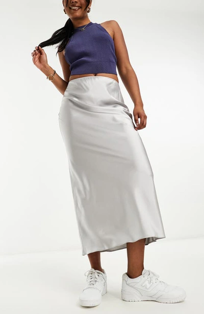 Shop Asos Design Bias Cut Satin Midi Skirt In Silver