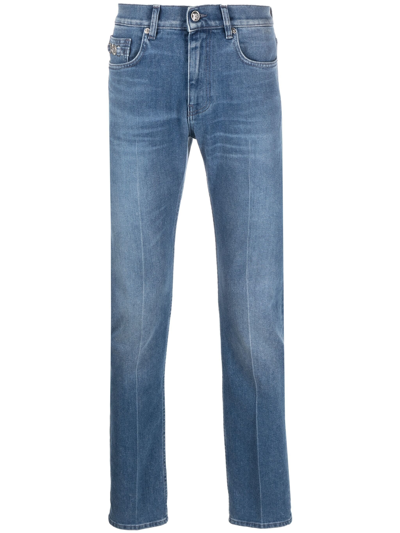 Shop Versace Slim Jeans With Appliqué In Blue