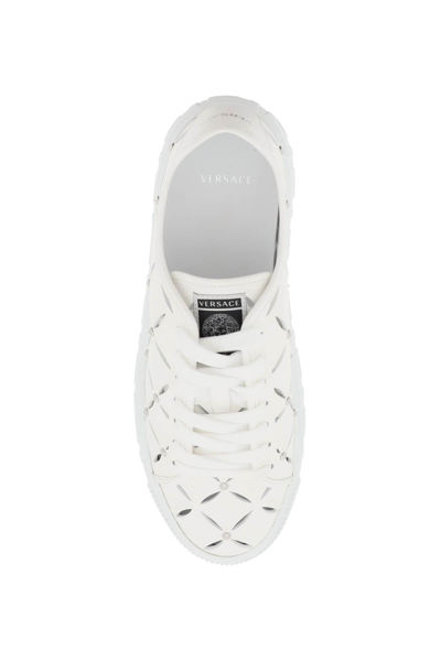 Shop Versace Greca Cut-out Sneakers Men In White