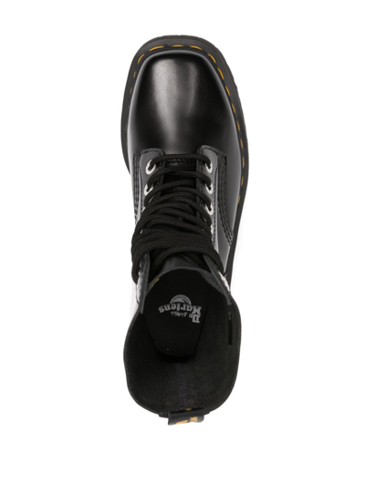 Dr. Martens' Platform Boots With Treaded Sole And Distinctive Accents In Black