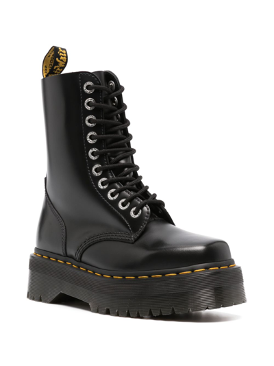 Dr. Martens' Platform Boots With Treaded Sole And Distinctive Accents In Black