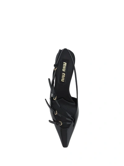 Shop Miu Miu Pumps In Nero