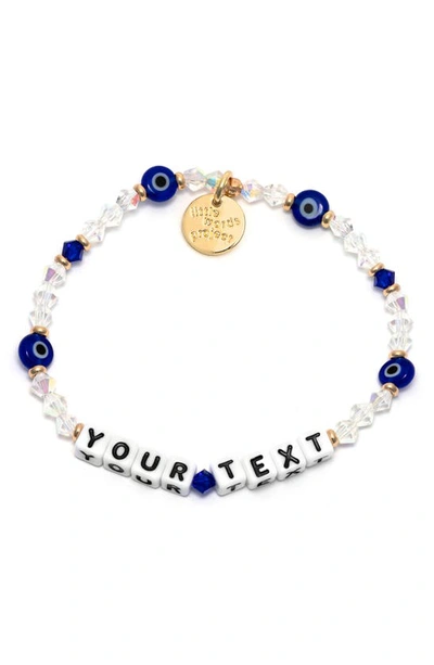 Shop Little Words Project Evil Eye Custom Beaded Stretch Bracelet In Crystal Blue