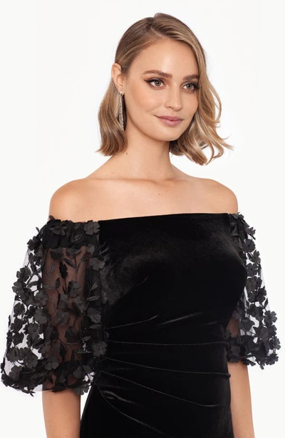 Shop Xscape Floral Appliqué Off The Shoulder Velvet Gown In Black