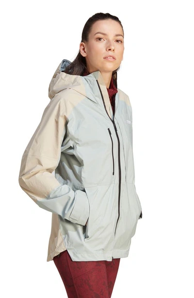 Shop Adidas Originals Terrex Xploric Rain.rdy Waterproof Hiking Jacket In Wonder Silver/ Wonder Beige