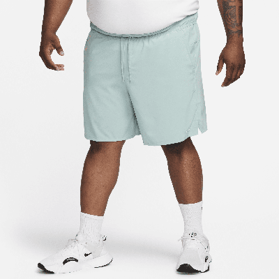 Shop Nike Men's Unlimited Dri-fit 7" Unlined Versatile Shorts In Green