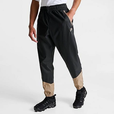 Shop Nike Men's Windrunner Woven Lined Pants In Black/khaki/khaki