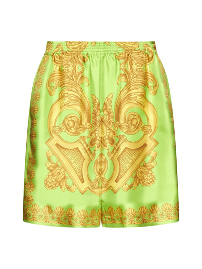 Shop Versace Shorts In Lime Gold