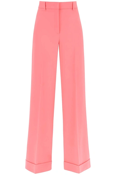 Shop Moschino Cuffed Palazzo Trousers In Cady In Pink
