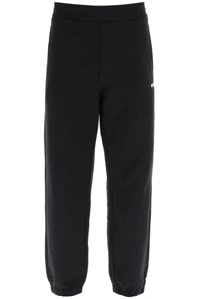 Shop Msgm Jogger Pants With Logo Print Detail In Black