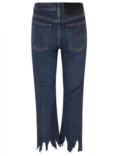 Shop Jw Anderson Lasercut Cropped Jeans In Indigo