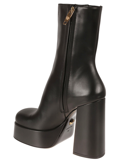 Shop Versace Block Heel Boots In Black/gold