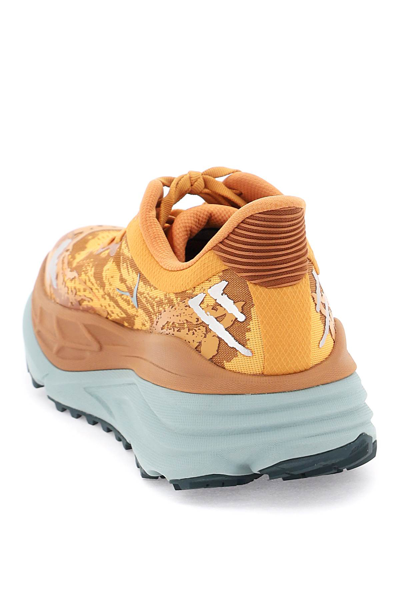 Shop Hoka Stinson 7 Sneakers In Amber Haze Amber Brown (orange)